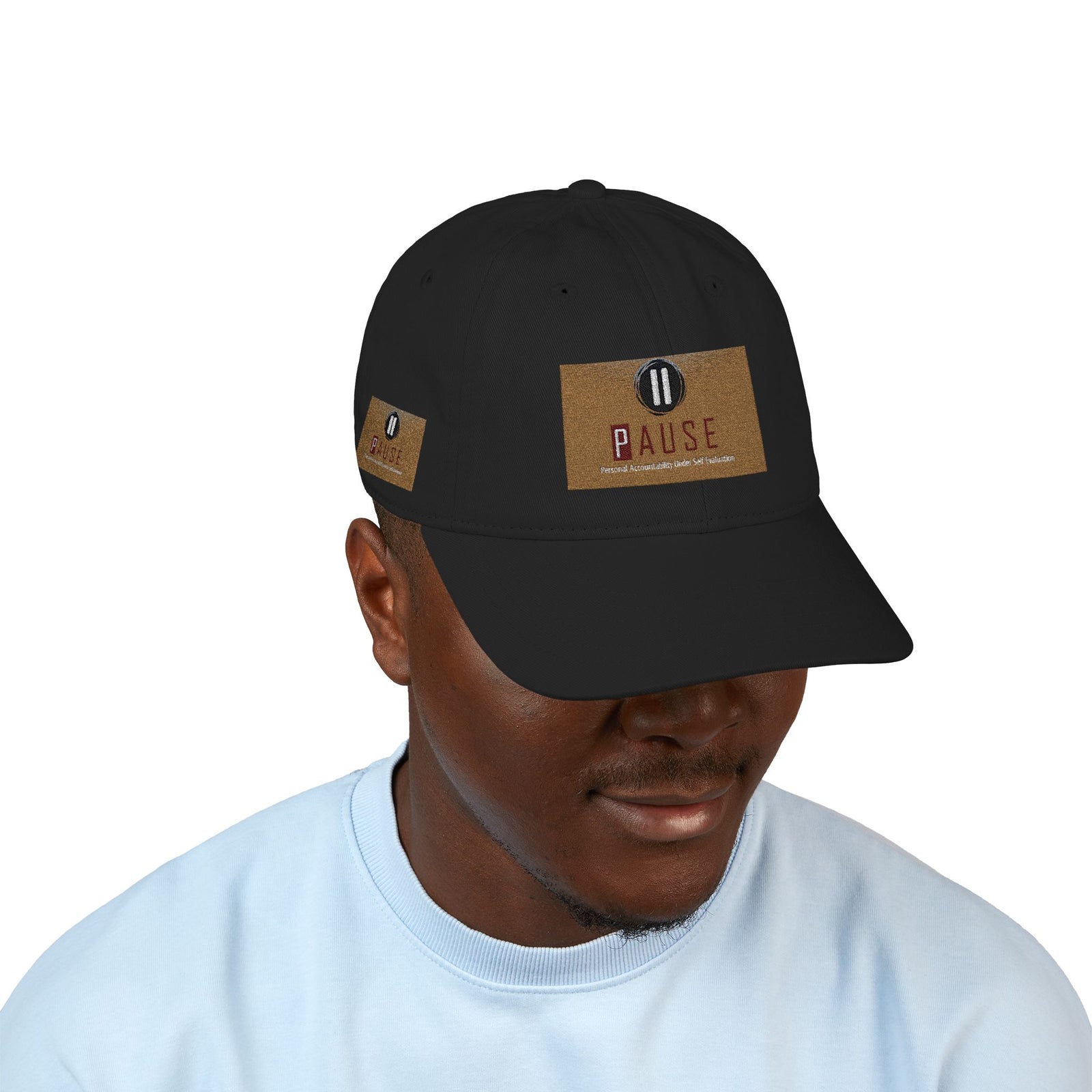 Cap Embroidered with 'Pause' Design