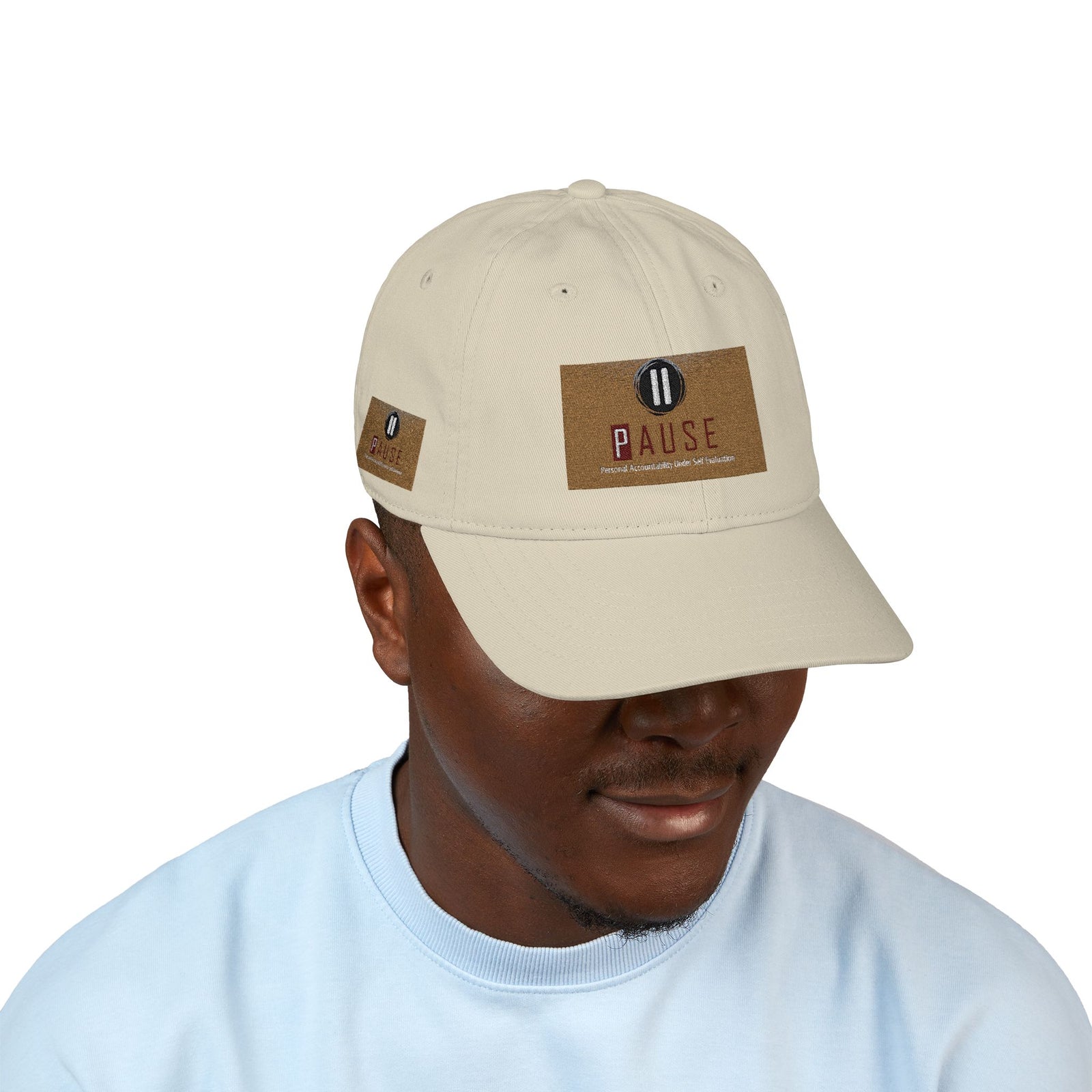 Cap Embroidered with 'Pause' Design